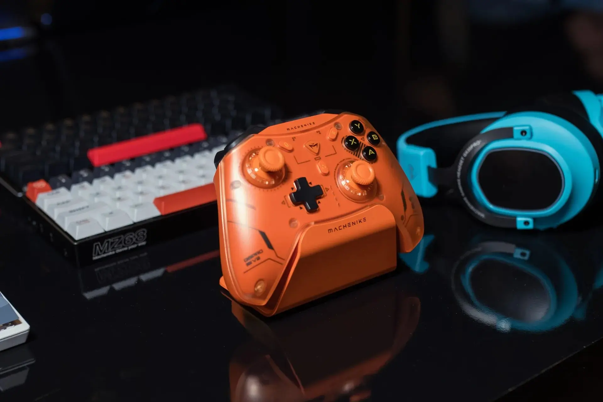 Gaming controller and headset on a desk